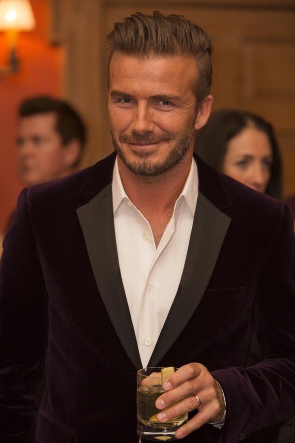 David Beckham in a black suit and grey vest at Meghan and Harry's wedding.  | Black suit wedding, Black suit white shirt, Best wedding suits for men